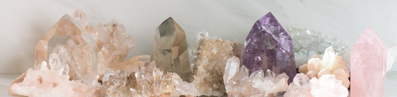 Shop interior featuring gemstones, healing crystals, and spiritual products