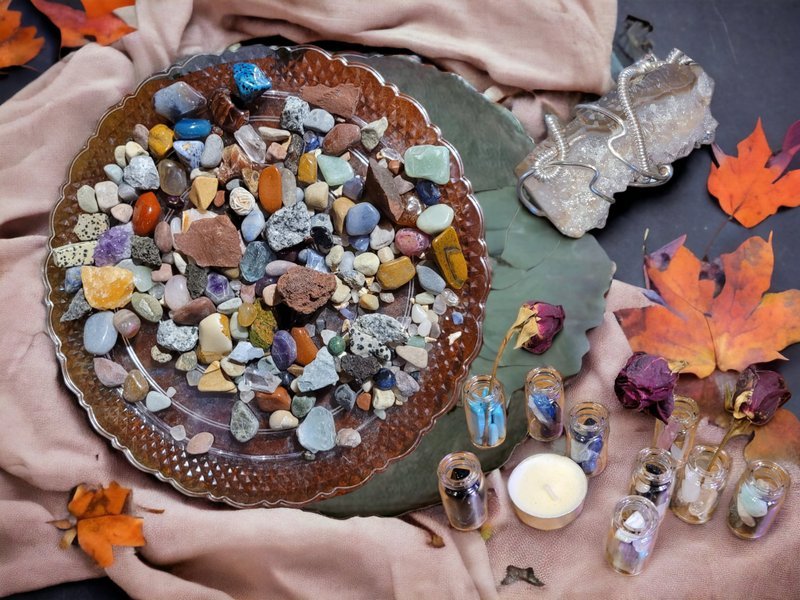 Variety of gemstones, crystal carvings, and polished mineral specimens