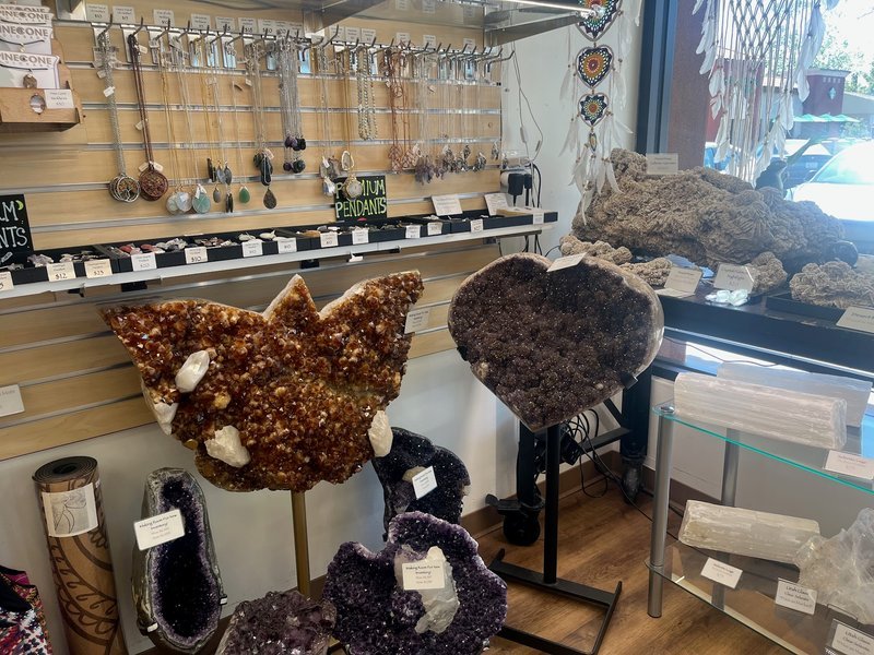 Store interior displaying crystals, minerals, and metaphysical supplies