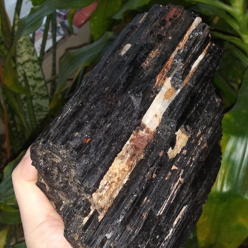 Selection of healing crystals, tumbled stones, and decorative mineral pieces