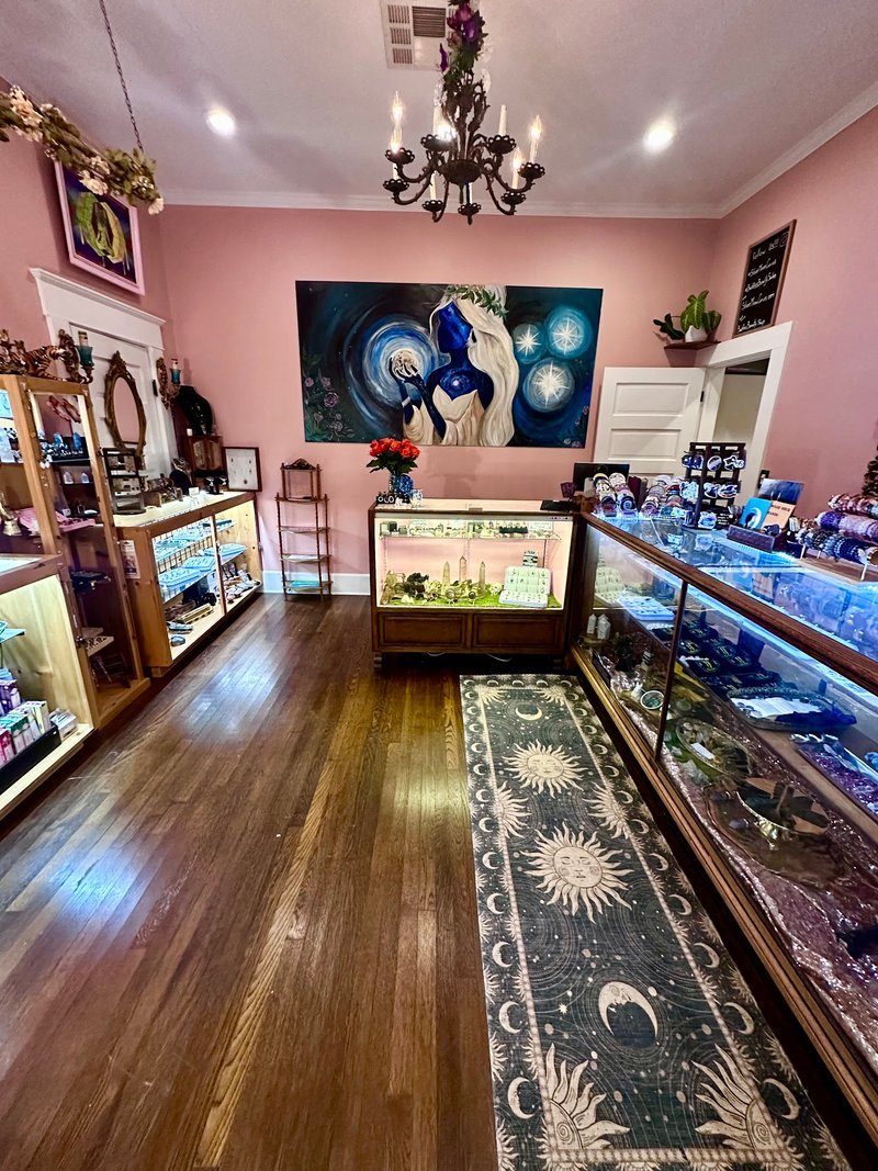 Interior view showcasing crystal towers, spheres, and carved stone pieces