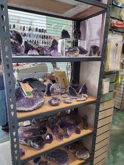 Selection of healing crystals, tumbled stones, and decorative mineral pieces