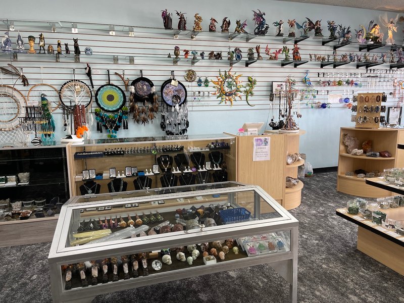 Retail display with tumbled stones, raw crystals, and polished specimens