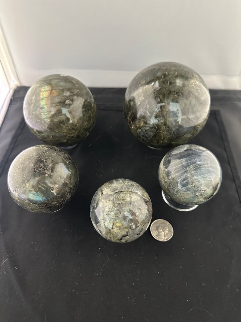 Display of polished crystal specimens, geodes, and mineral towers