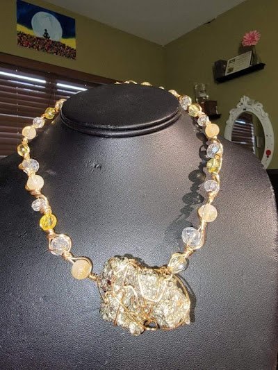 Crystal and mineral specimens including quartz, amethyst, and calcite varieties