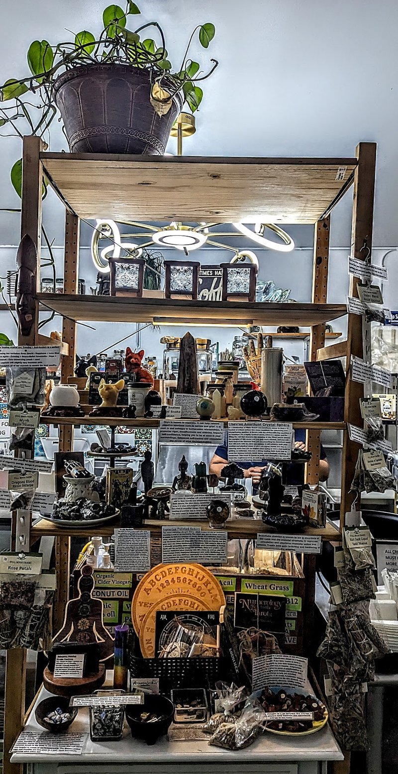 Retail display with tumbled stones, raw crystals, and polished specimens