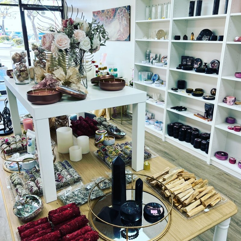Organized crystal display with labeled stones and healing minerals