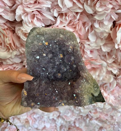 Collection of raw crystals, polished stones, and unique mineral formations