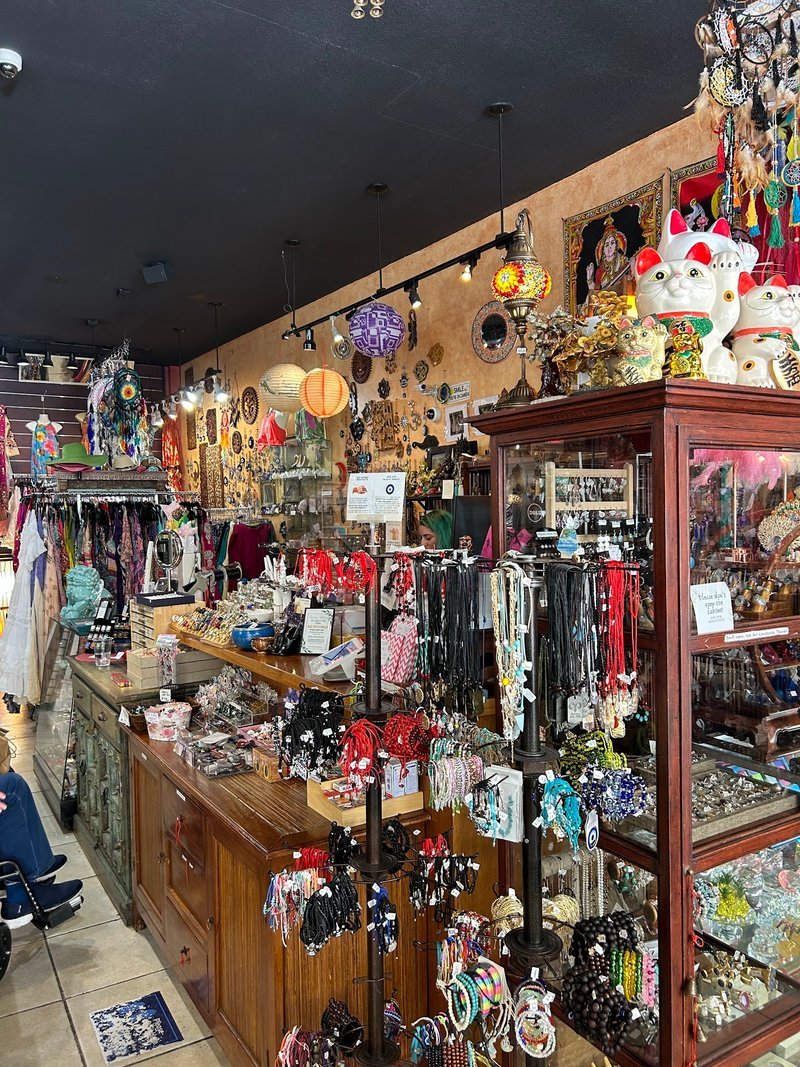 Collection of tumbled stones, raw minerals, and crystal clusters