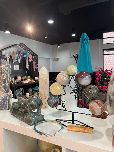 Interior view showcasing crystal towers, spheres, and carved stone pieces