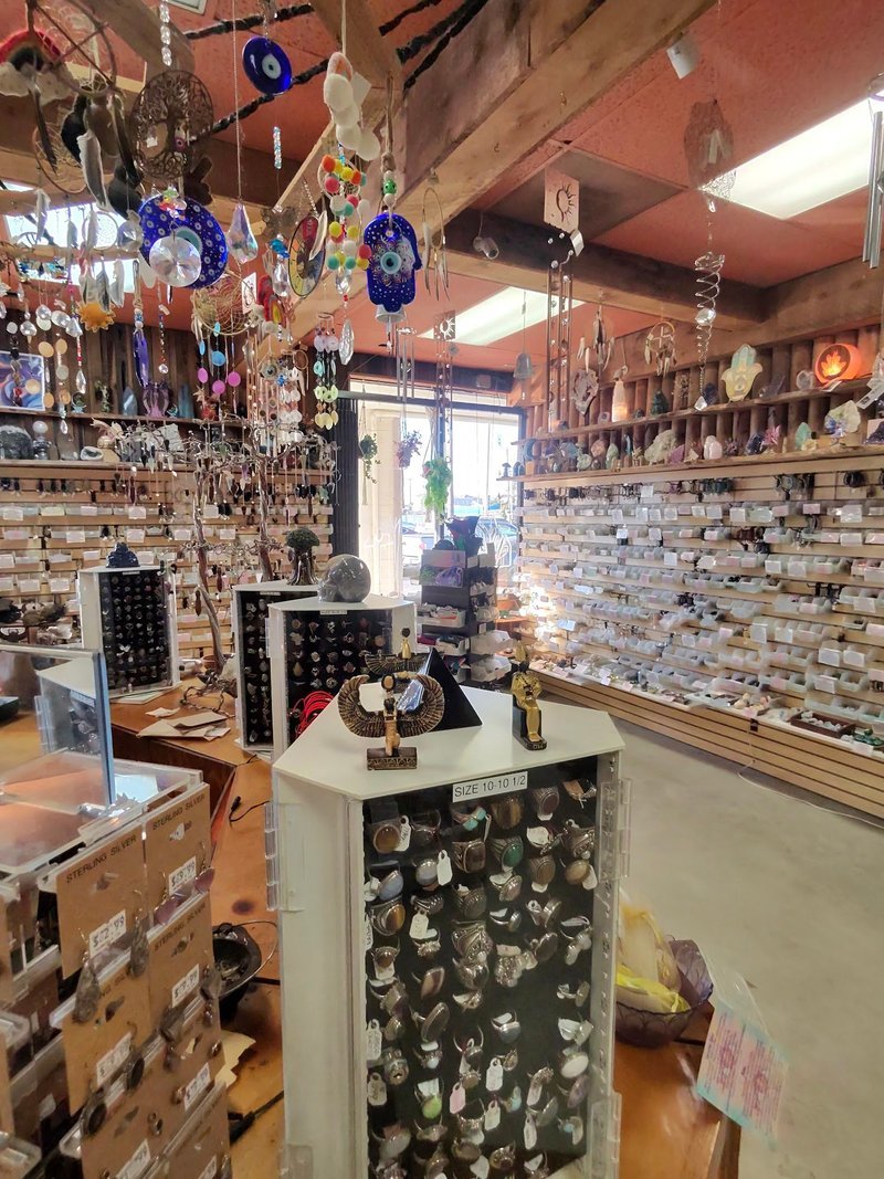 Interior view showcasing crystal towers, spheres, and carved stone pieces