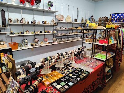 Vintage wooden tray with amber, citrine, and tiger eye tumbled stones
