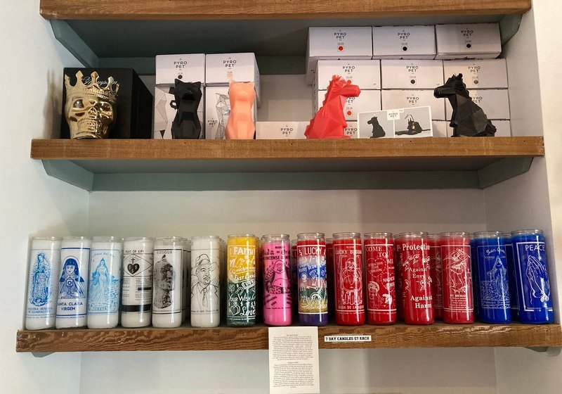 Variety of gemstones, crystal carvings, and polished mineral specimens