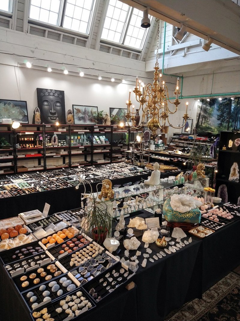 Crystal and mineral specimens including quartz, amethyst, and calcite varieties