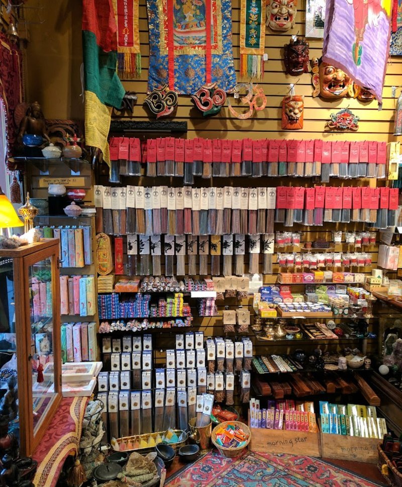 Retail display with tumbled stones, raw crystals, and polished specimens