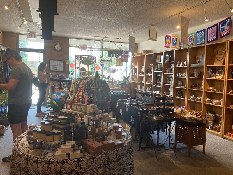 Organized crystal display with labeled stones and healing minerals