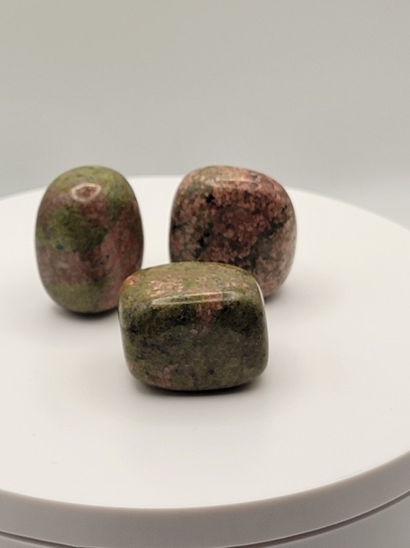 Retail shelving with organized crystals, stones, and spiritual products