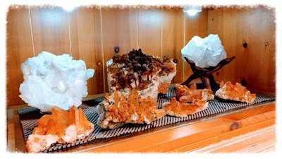 Crystal and mineral display with organized specimens and inventory