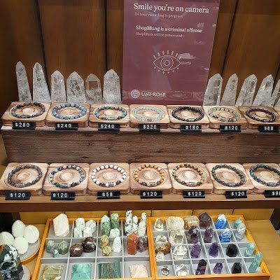 Interior view showcasing crystal towers, spheres, and carved stone pieces