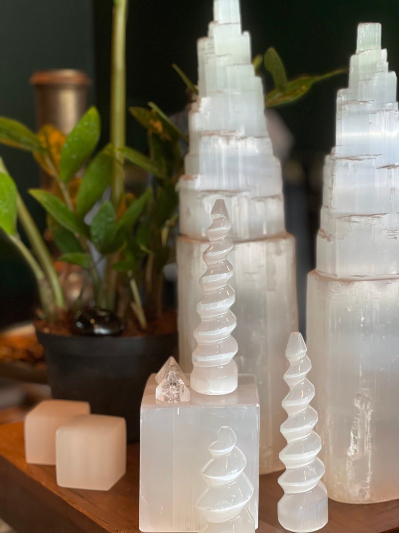 Interior view showcasing crystal towers, spheres, and carved stone pieces